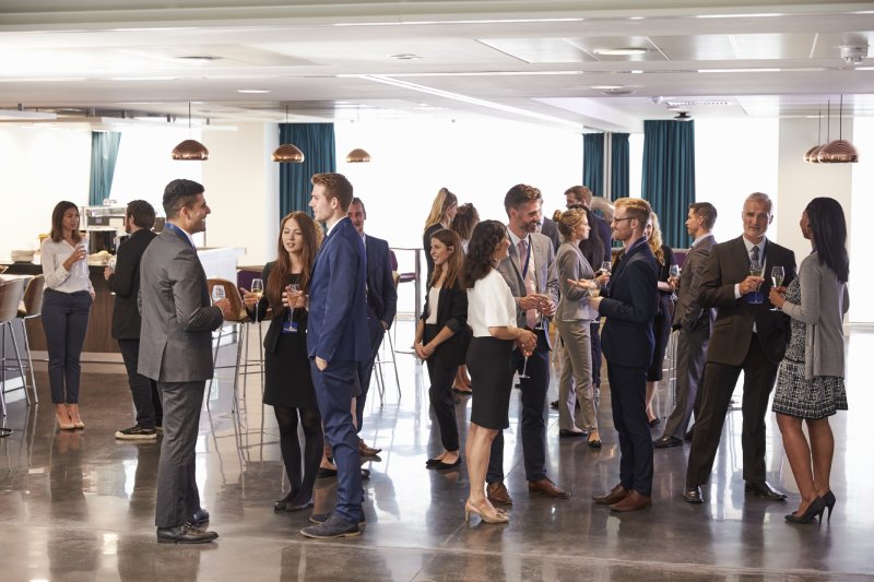 Large group of professionals at a networking event